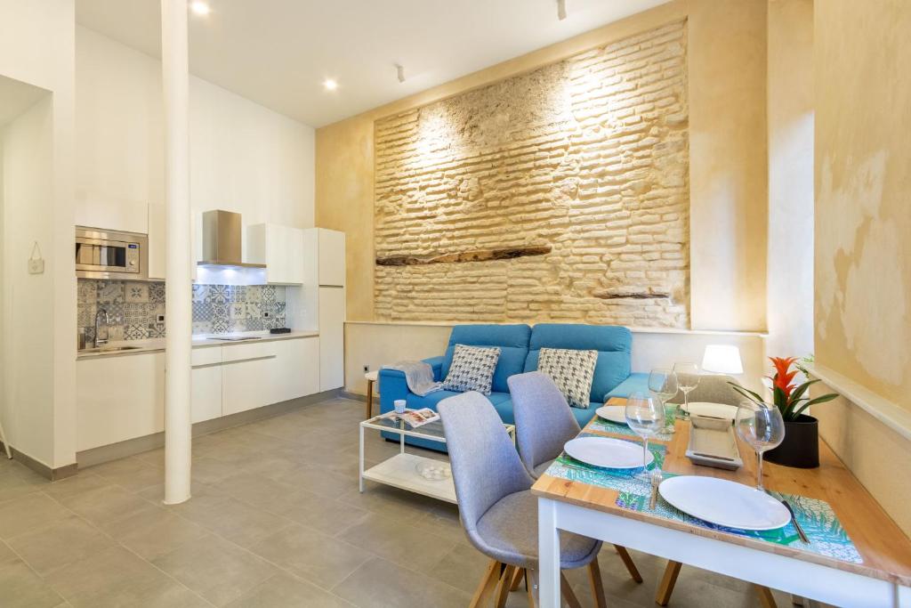 A kitchen or kitchenette at Nine O Clock San Agustin Suites