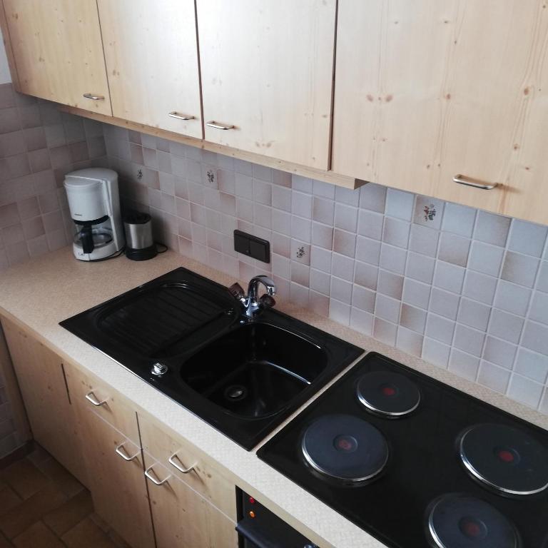 Kuchyň nebo kuchyňský kout v ubytování Gästehaus Wilhelmshof