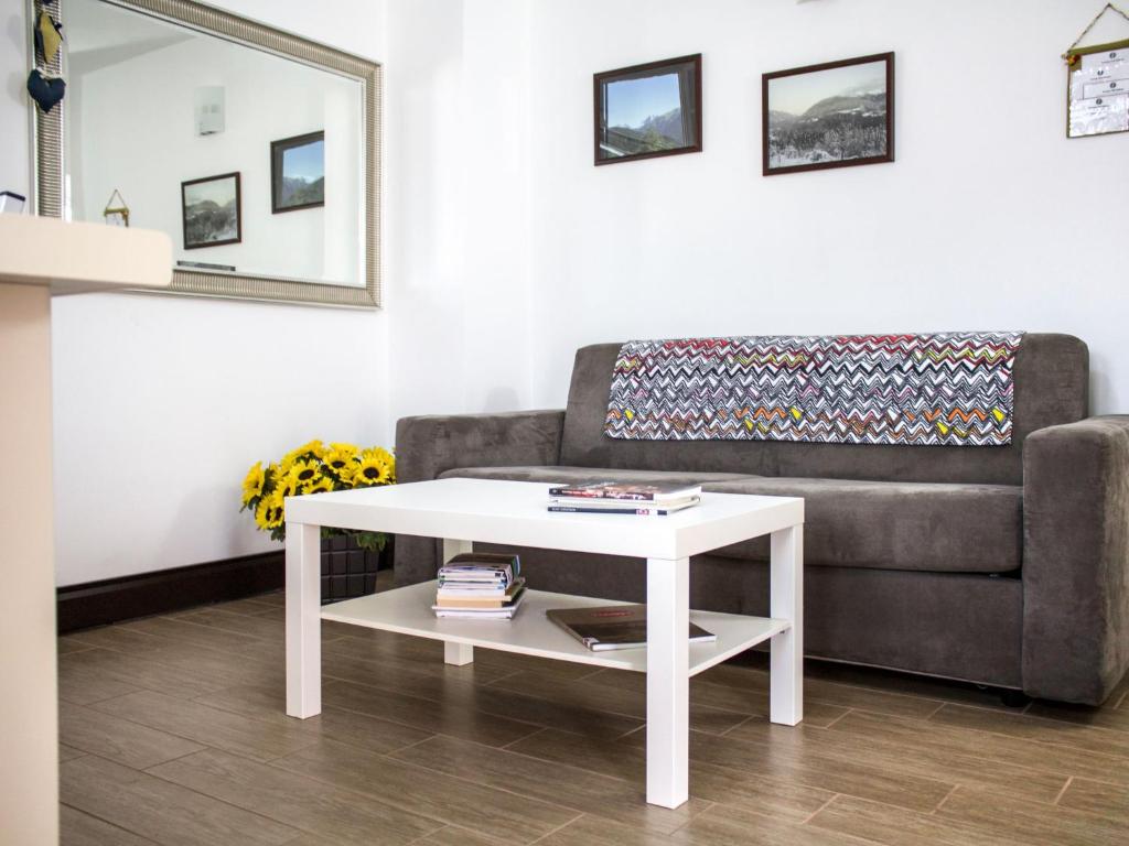 A seating area at Apartment Casa Rasat-1 by Interhome