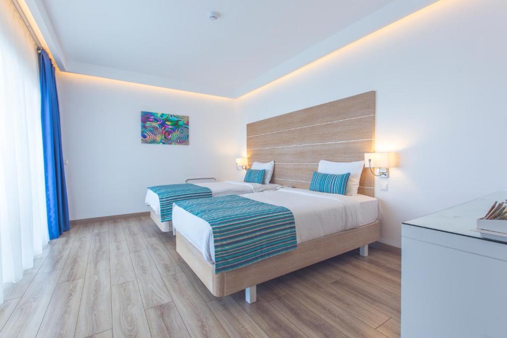 Postel nebo postele na pokoji v ubytování Garcia Resort & Spa - Ultra All Inclusive