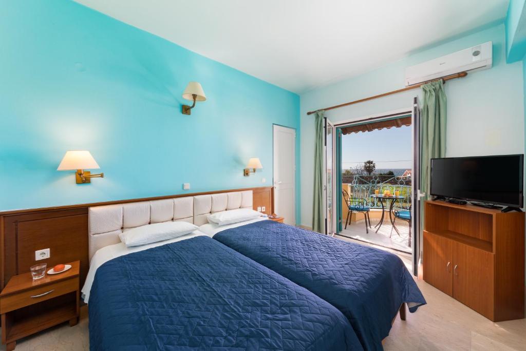 Postel nebo postele na pokoji v ubytování Poseidon Suites by CorfuEscapes
