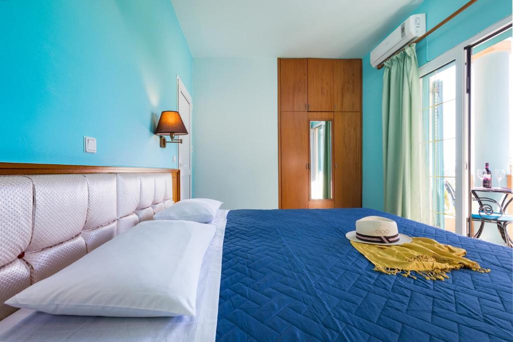 Postel nebo postele na pokoji v ubytování Poseidon Suites by CorfuEscapes