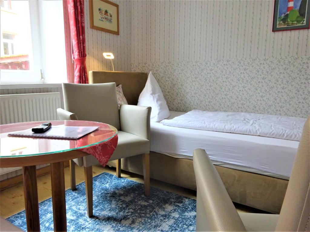 Postel nebo postele na pokoji v ubytování Hotel Pension Zur Fährbrücke