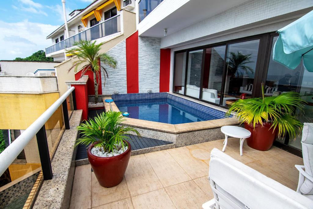  Ap com WiFi piscina e praia privativa no Guaruja