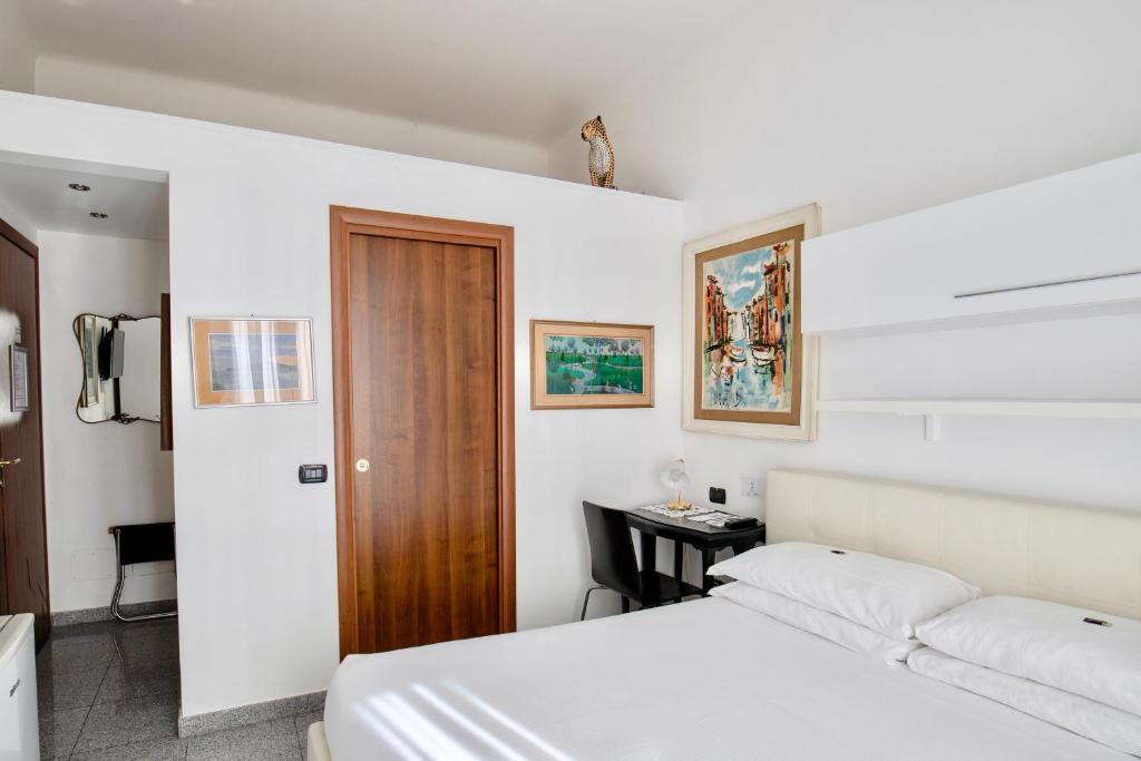 Postel nebo postele na pokoji v ubytování Aiello Suites Milan