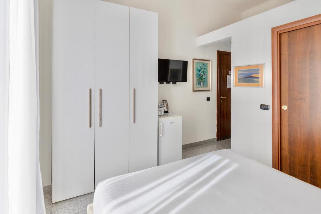 Postel nebo postele na pokoji v ubytování Aiello Suites Milan