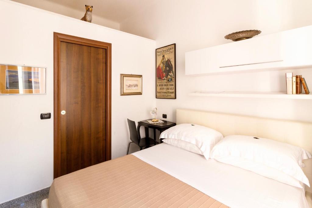 Postel nebo postele na pokoji v ubytování Aiello Suites Milan