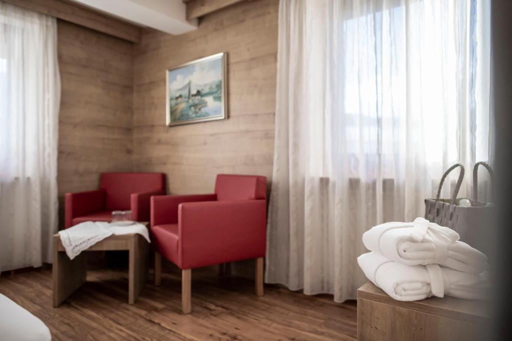 Posezení v ubytování Hotel Plan Murin