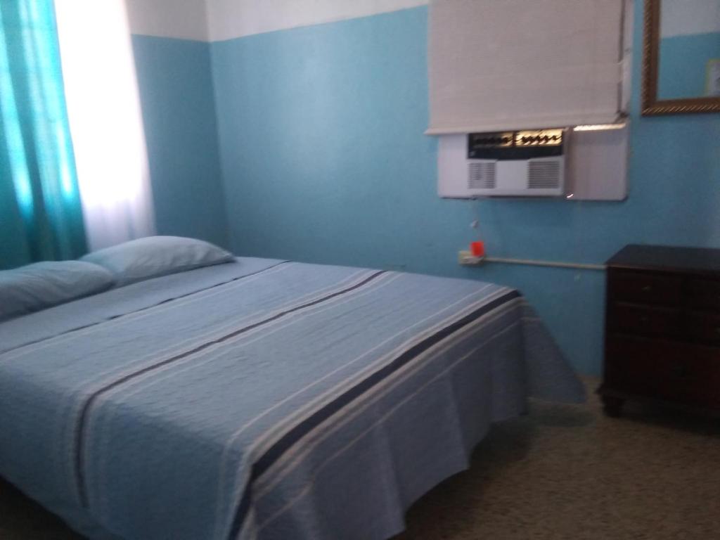 Postel nebo postele na pokoji v ubytování Brisas de Borinquen