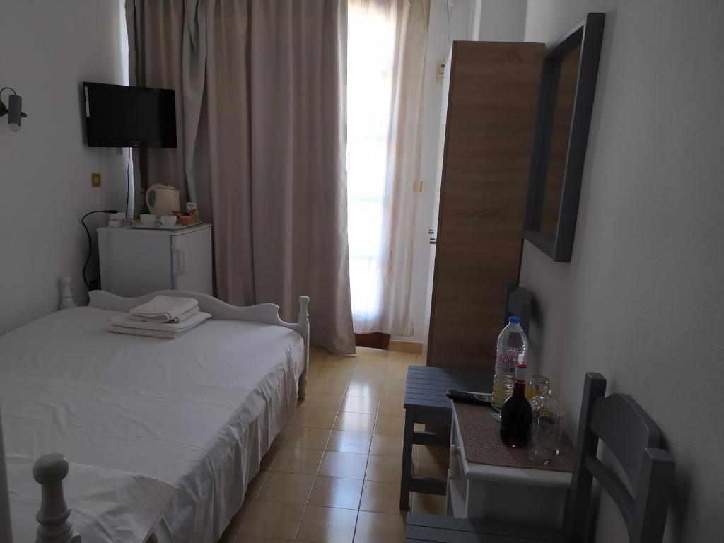 Posteľ alebo postele v izbe v ubytovaní Nitsas studio's