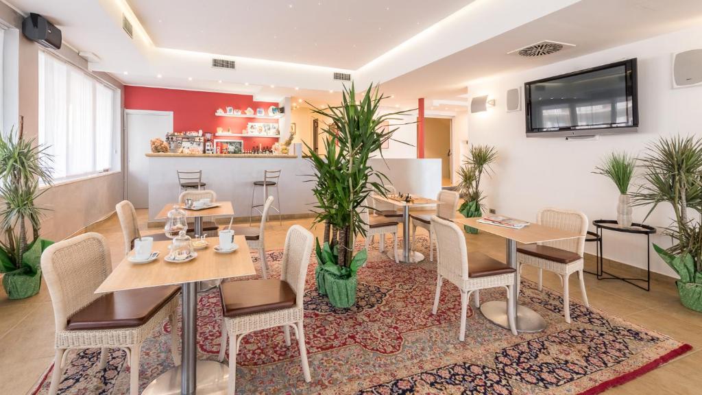 TV a/nebo společenská místnost v ubytování Hotel Katja