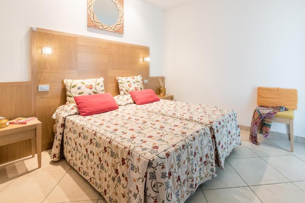 Postel nebo postele na pokoji v ubytování Hotel Katja