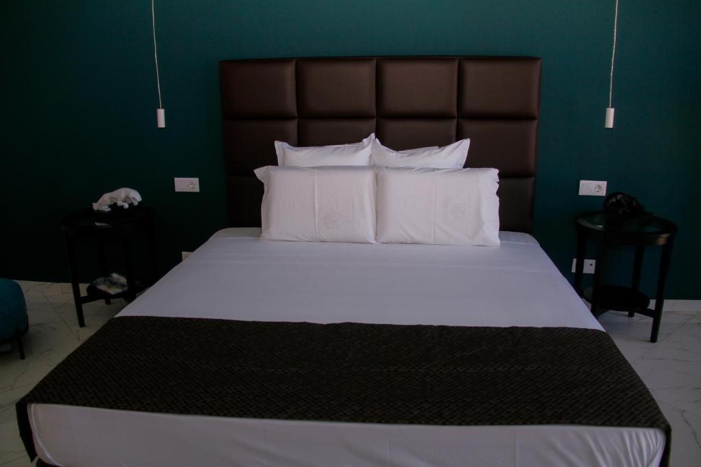 Postel nebo postele na pokoji v ubytování Hotel Por Do Sol