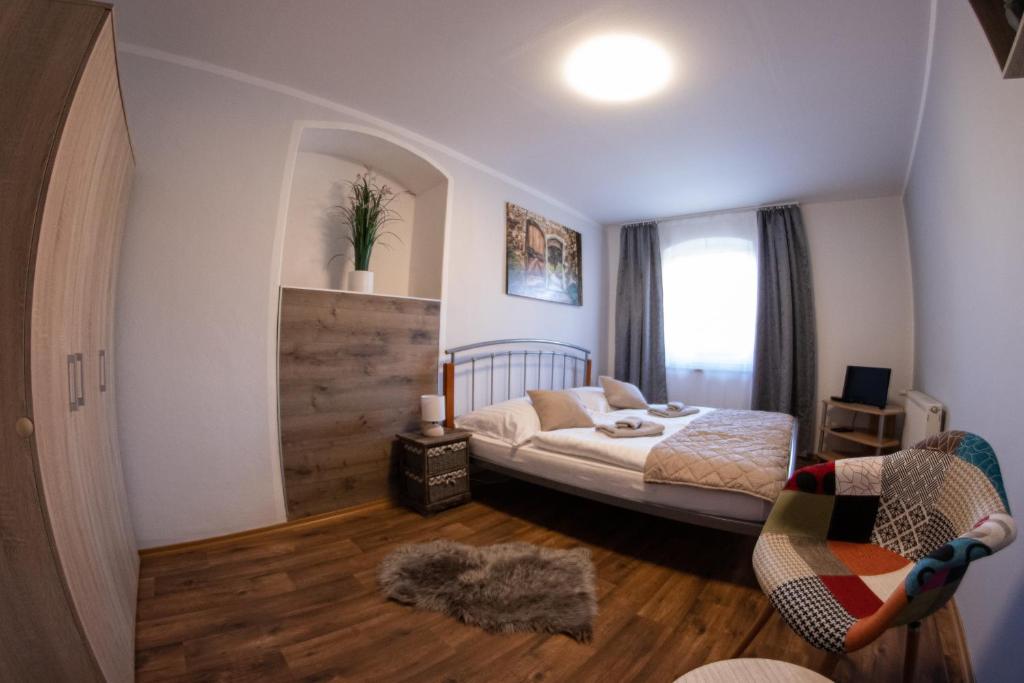 Postel nebo postele na pokoji v ubytování Penzion Pohoda