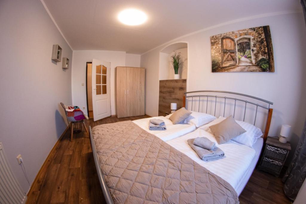 Postel nebo postele na pokoji v ubytování Penzion Pohoda