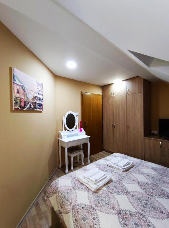Postel nebo postele na pokoji v ubytování Apartmani Milošević