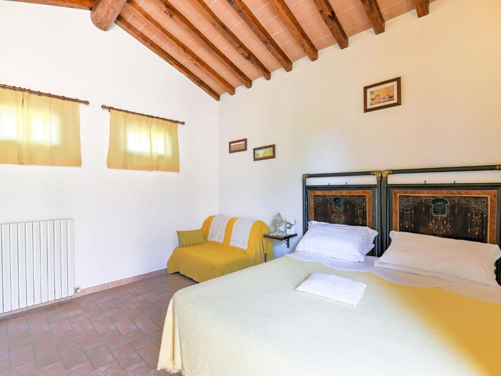 Postel nebo postele na pokoji v ubytování Holiday Home in Tuscany with Pool
