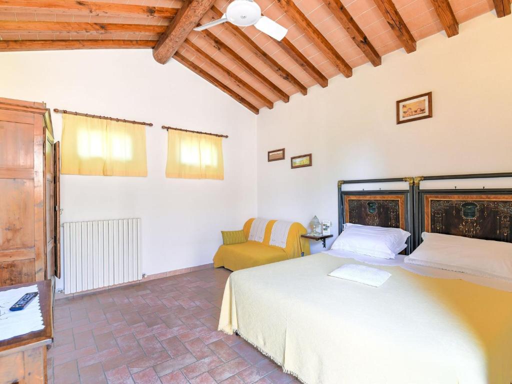 Postel nebo postele na pokoji v ubytování Holiday Home in Tuscany with Pool