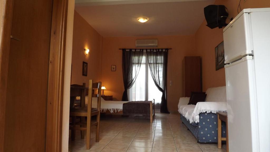 Postel nebo postele na pokoji v ubytování Pefka Studios & Apartments