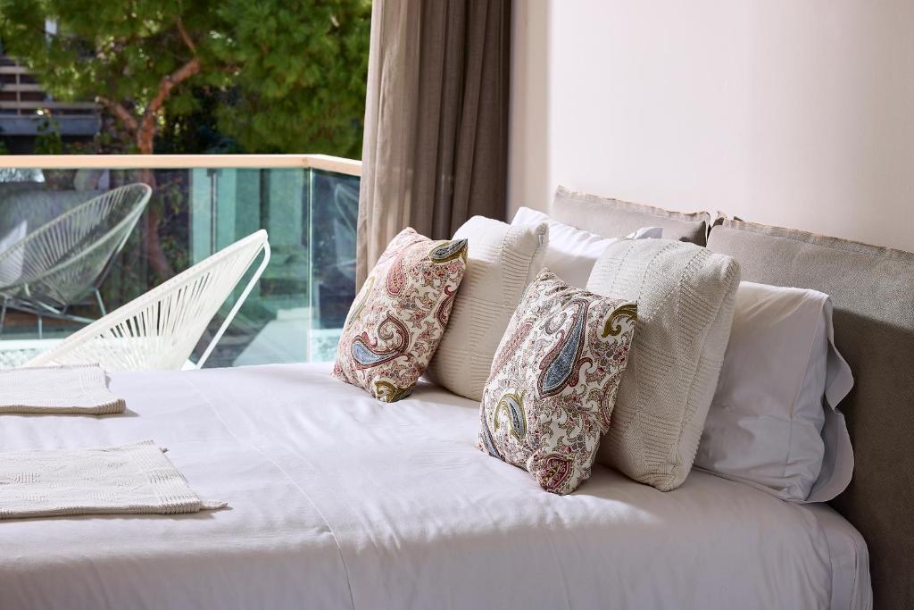 Posteľ alebo postele v izbe v ubytovaní Elaia Luxury Condo Glyfada