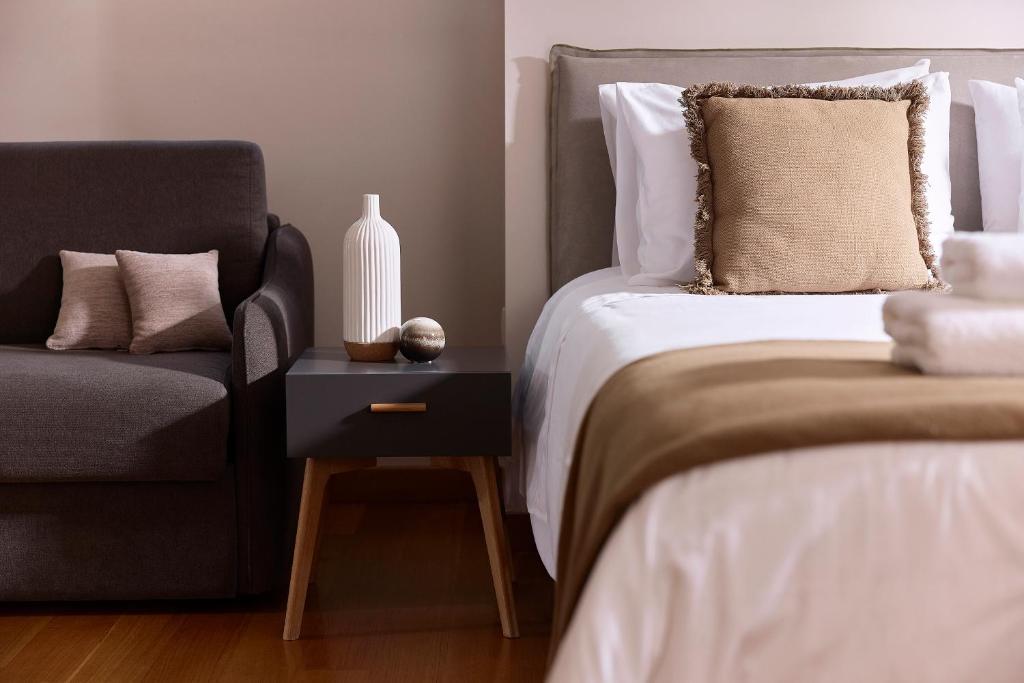 Posteľ alebo postele v izbe v ubytovaní Elaia Luxury Condo Glyfada