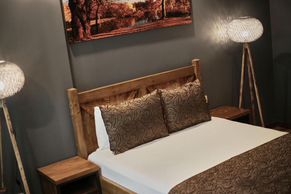 Postel nebo postele na pokoji v ubytování Zengin City Hotel