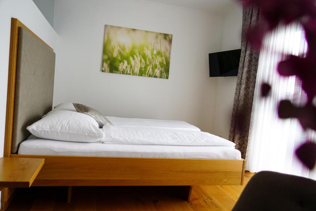 Postel nebo postele na pokoji v ubytování Walters Weinquartier