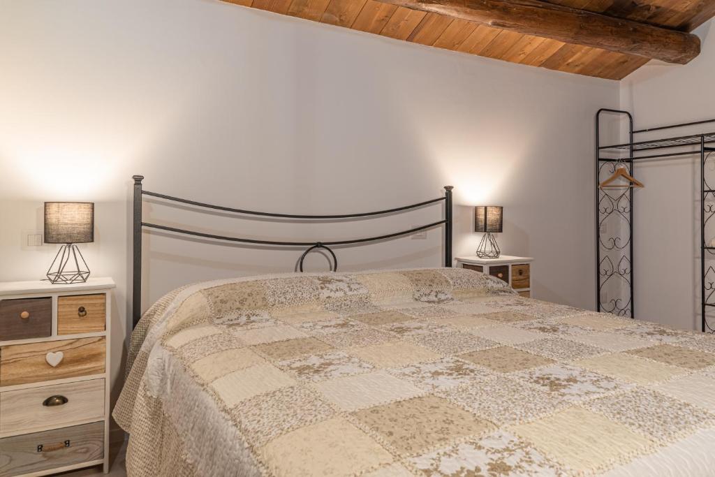 Postel nebo postele na pokoji v ubytování Appartamenti Monte Selce
