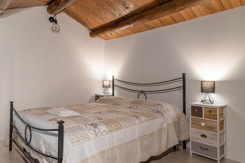 Postel nebo postele na pokoji v ubytování Appartamenti Monte Selce