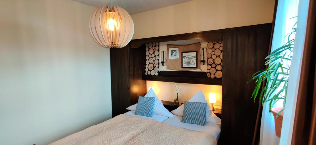 Postel nebo postele na pokoji v ubytování Hotel Restaurant Tomahawk