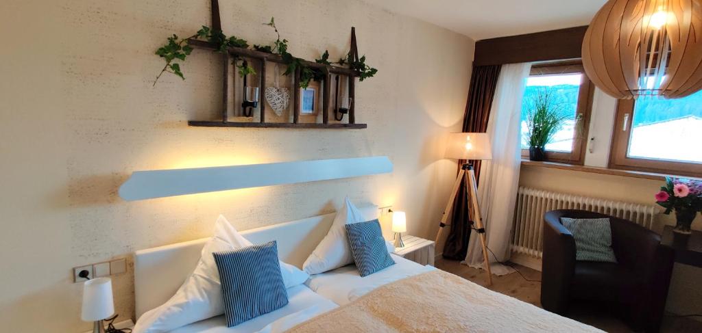 Postel nebo postele na pokoji v ubytování Hotel Restaurant Tomahawk
