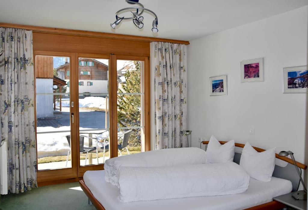 Postel nebo postele na pokoji v ubytování Schnider Bed&Breakfast und Café