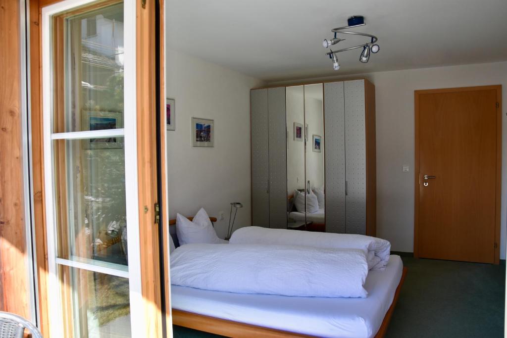 Postel nebo postele na pokoji v ubytování Schnider Bed&Breakfast und Café
