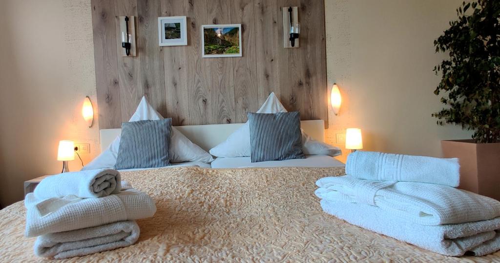 Postel nebo postele na pokoji v ubytování Hotel Restaurant Tomahawk