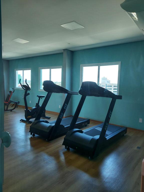 The fitness centre and/or fitness facilities at Aluguel Temporada - Smart Itapuã