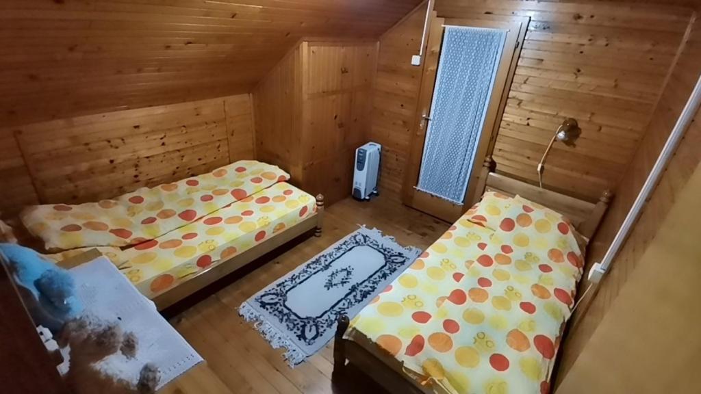 Postel nebo postele na pokoji v ubytování Vila President Divcibare
