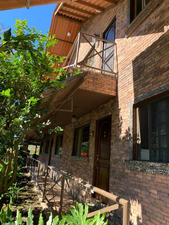 Balkón nebo terasa v ubytování Stone Cabins Boquete