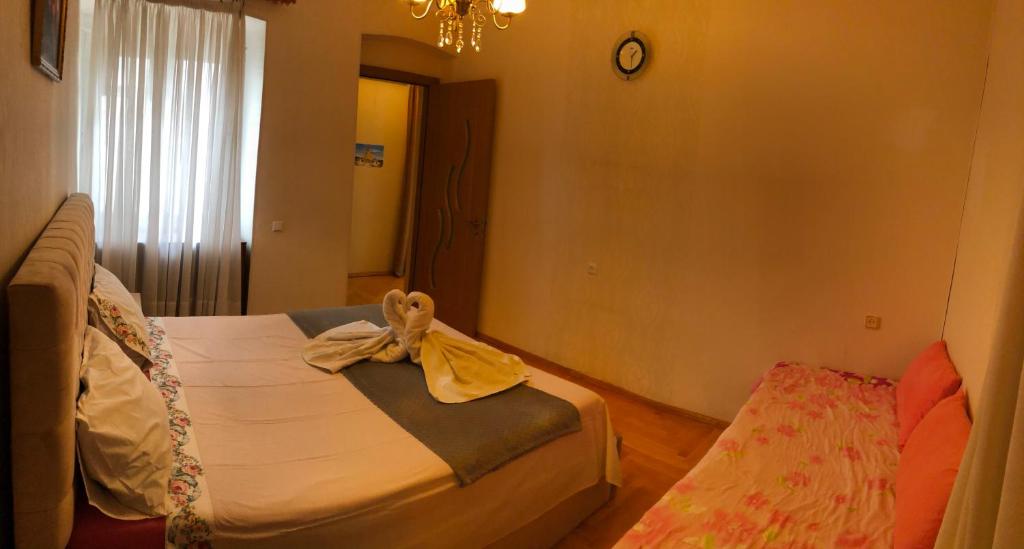 Postel nebo postele na pokoji v ubytování Aparment on Nano