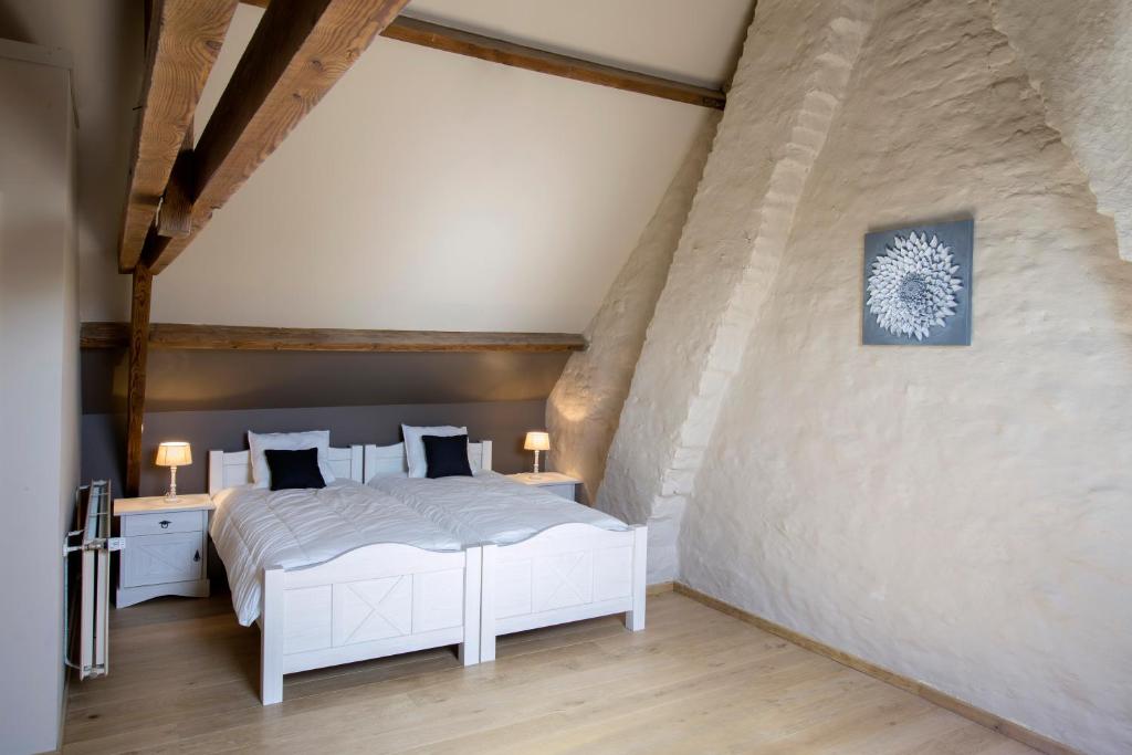 Postel nebo postele na pokoji v ubytování Holiday Home De Maalderij