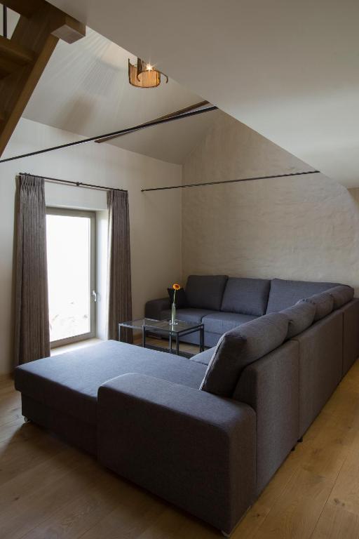 Posezení v ubytování Holiday Home De Maalderij