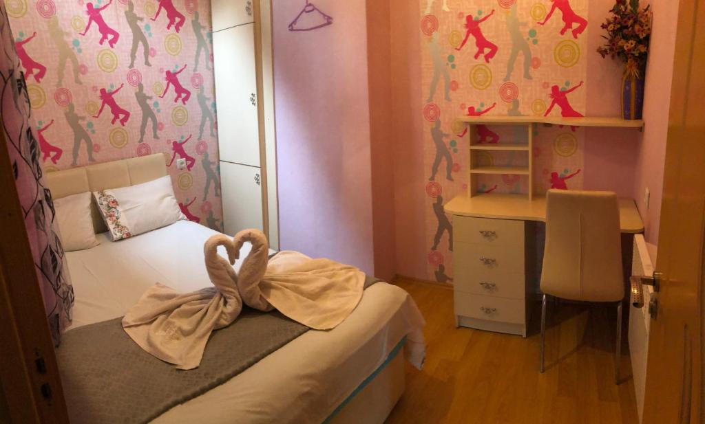 Postel nebo postele na pokoji v ubytování Aparment on Nano