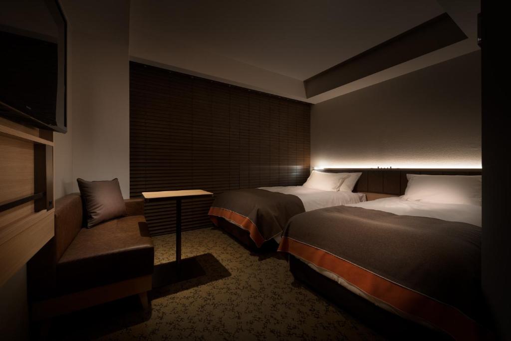 Postel nebo postele na pokoji v ubytování Nest Hotel Tokyo Hanzomon