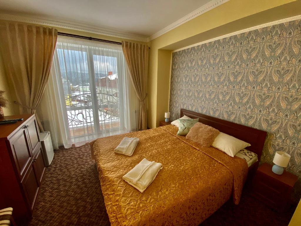 Ліжко або ліжка в номері Hotel Three Korony