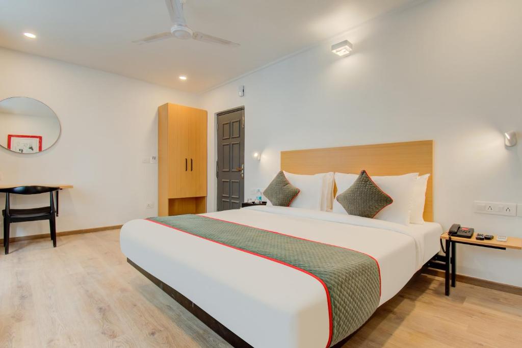 Postel nebo postele na pokoji v ubytování Hotel Maitrayee