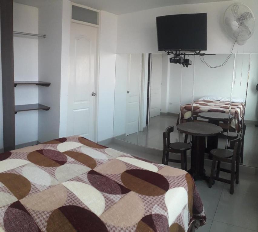 Postel nebo postele na pokoji v ubytování Hostal Sueños