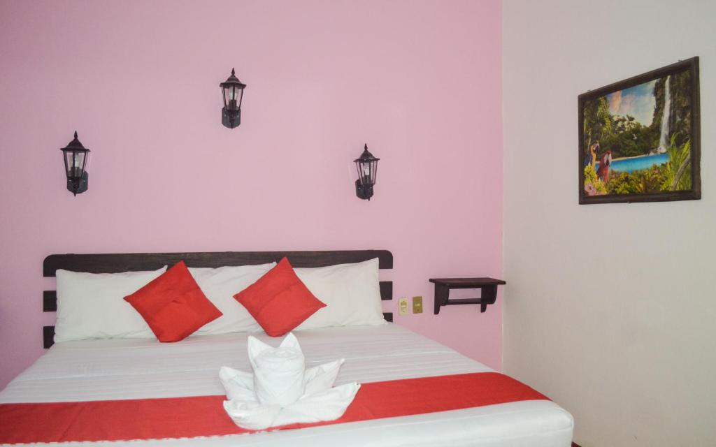 Postel nebo postele na pokoji v ubytování Hotel Kashlan Palenque