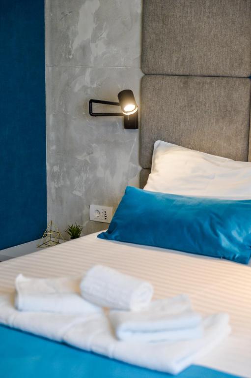 Postel nebo postele na pokoji v ubytování Garni hotel King