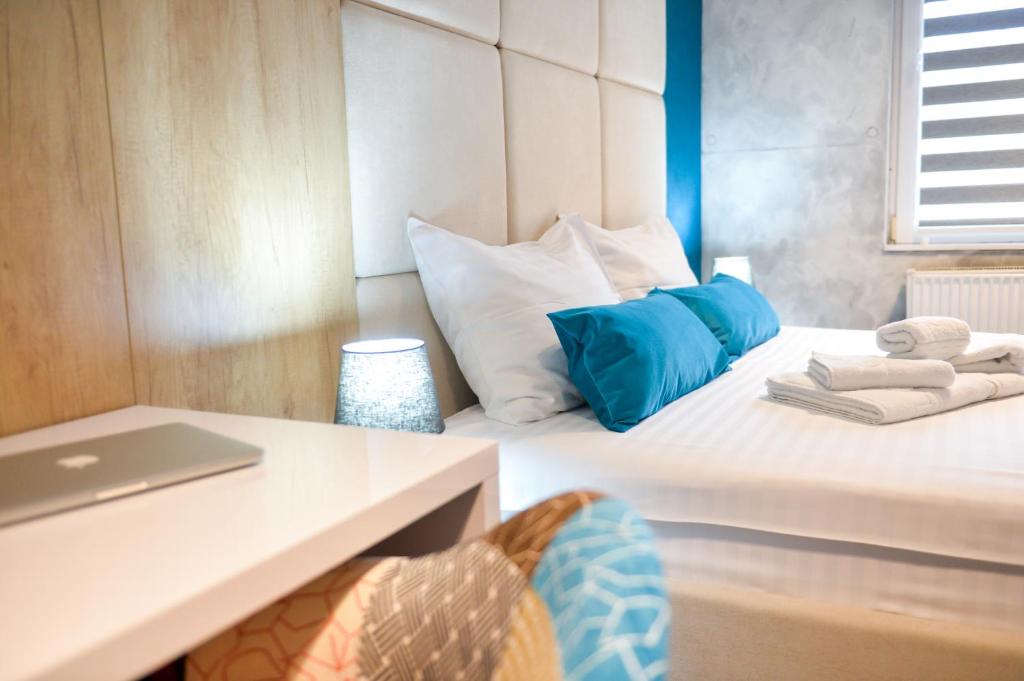 Postel nebo postele na pokoji v ubytování Garni hotel King