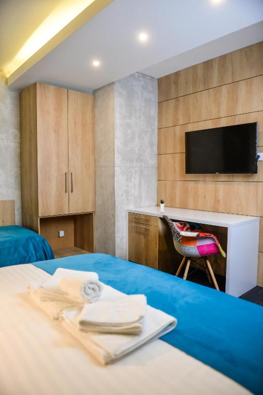 TV a/nebo společenská místnost v ubytování Garni hotel King
