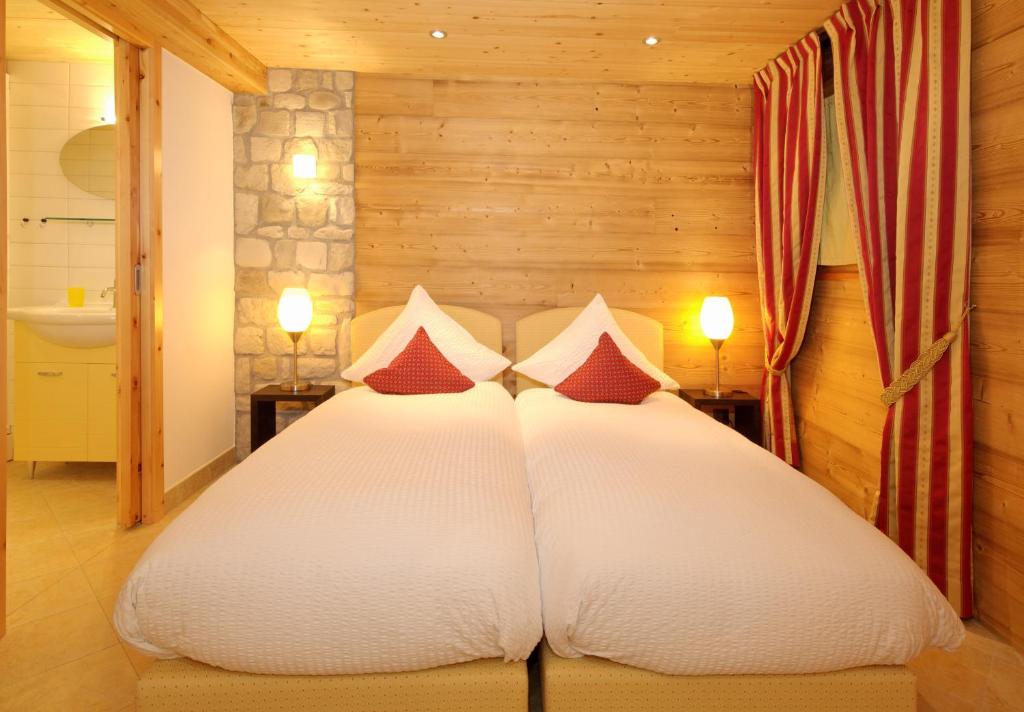Cama o camas de una habitación en Ferienapartement Hinterdorf